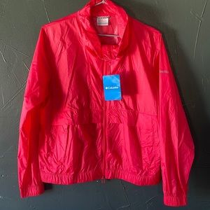 Columbia sunny city windbreaker coral in color